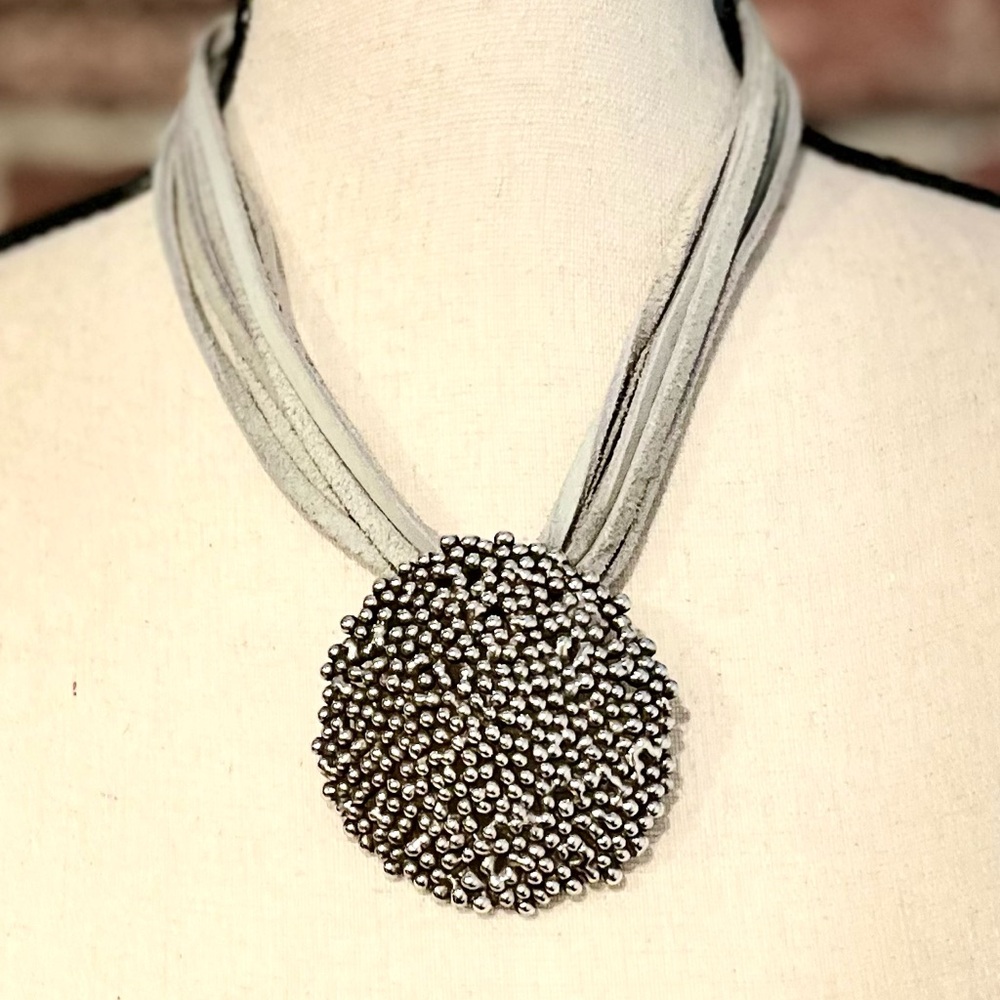 Make a statement with this unique necklace!